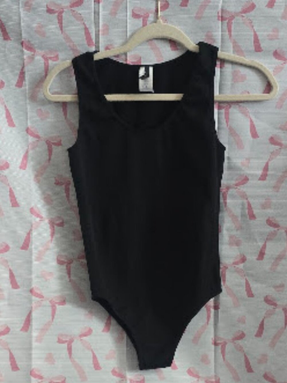 The Essential Sleeveless Scoop-Neck Bodysuit